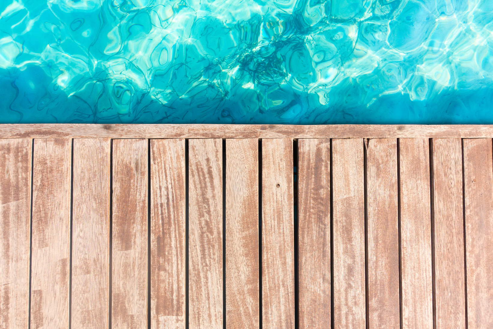 Empty wooden pool deck