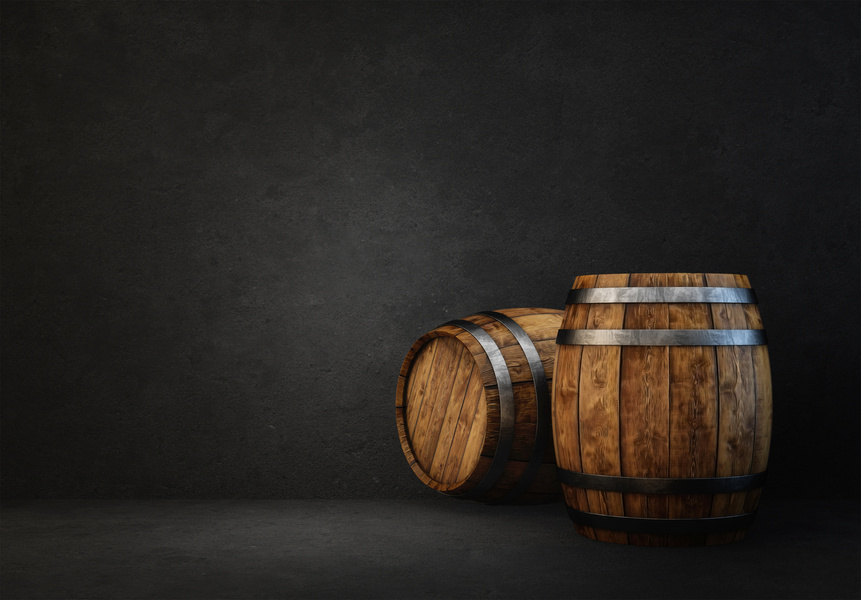 Two Wooden Barrels on Dark Background 